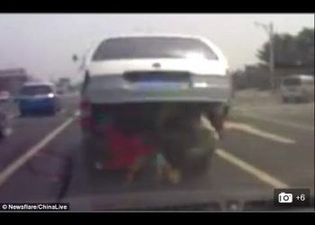 Children tumble to street after falling from minivan boot