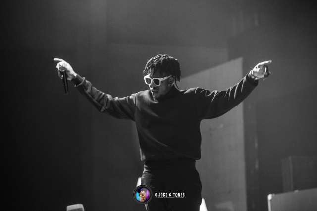 Singer Runtown Strikes A Pose Holding A Fire Arm