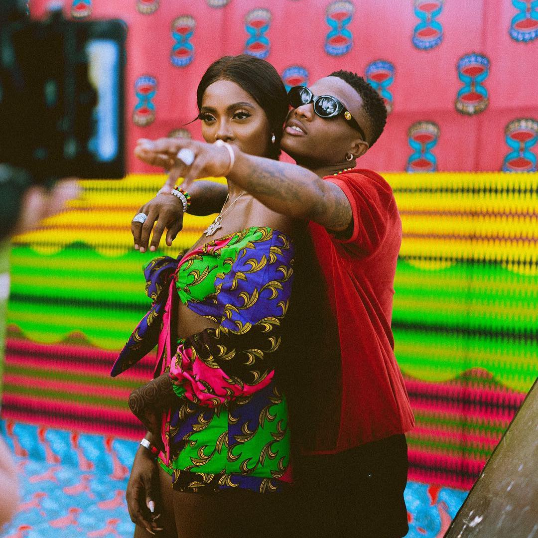 Tiwa Savage Grabs Wizkid From Behind During Stage Performance