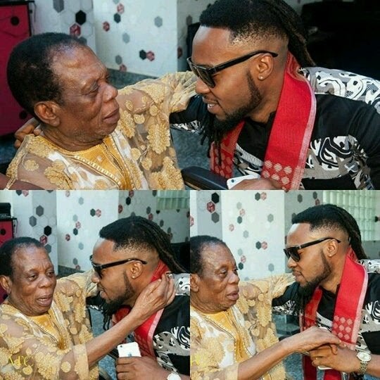 Singer Flavour Plays Guitar While Singing For His Aged Father (Video)