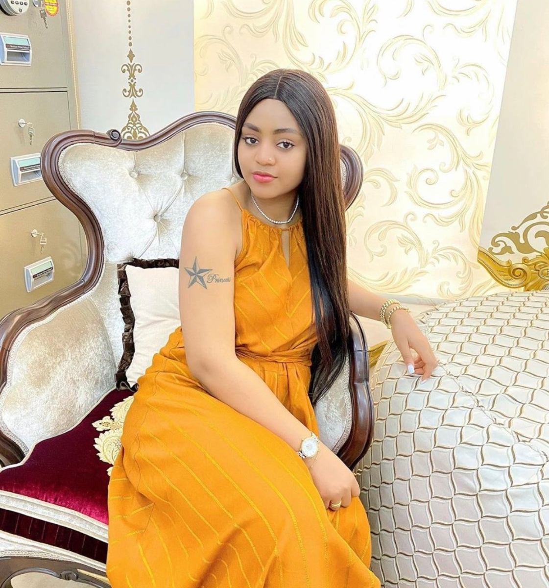 Regina Daniels Tries To Conceal Her Baby Bump While On A Movie Set (Photo)