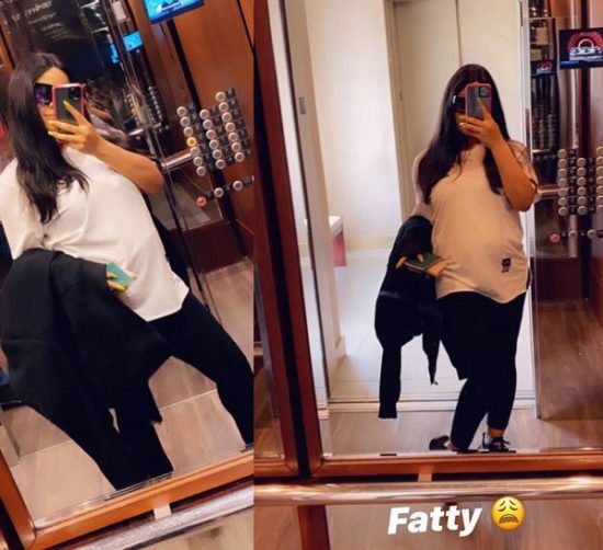 Nina flaunts her growing baby bump in new photos