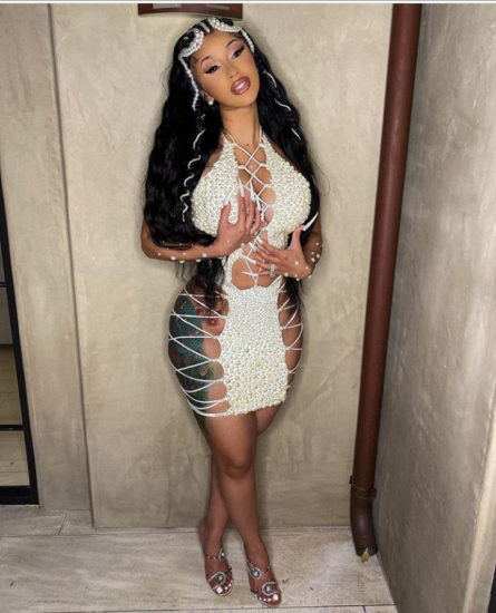 All white and pearly! Cardi B decorates herself with white pearls in new photos