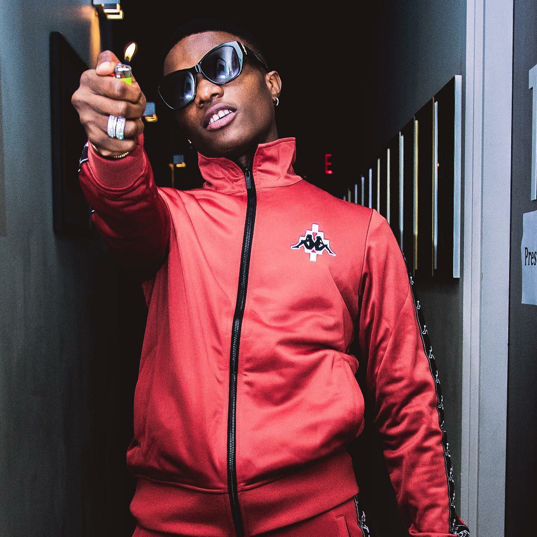 Donald Trump is not your business old man! Wizkid fires angrily at President Buhari
