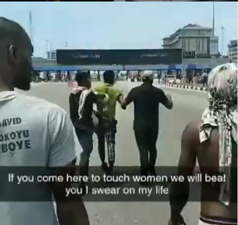 End SARS protesters beat up a young man accused of inappropriately touching a woman at the Lekki protest (video)