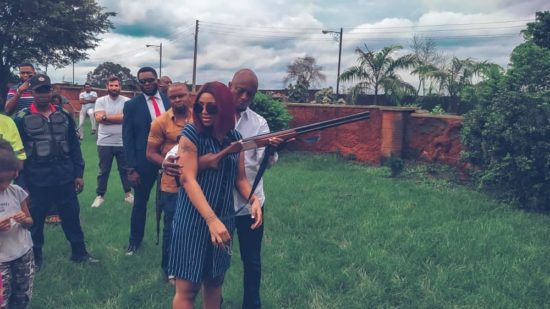 Ned Nwoko Teaches Scared Regina Daniels How To Shoot A Gun (Video)