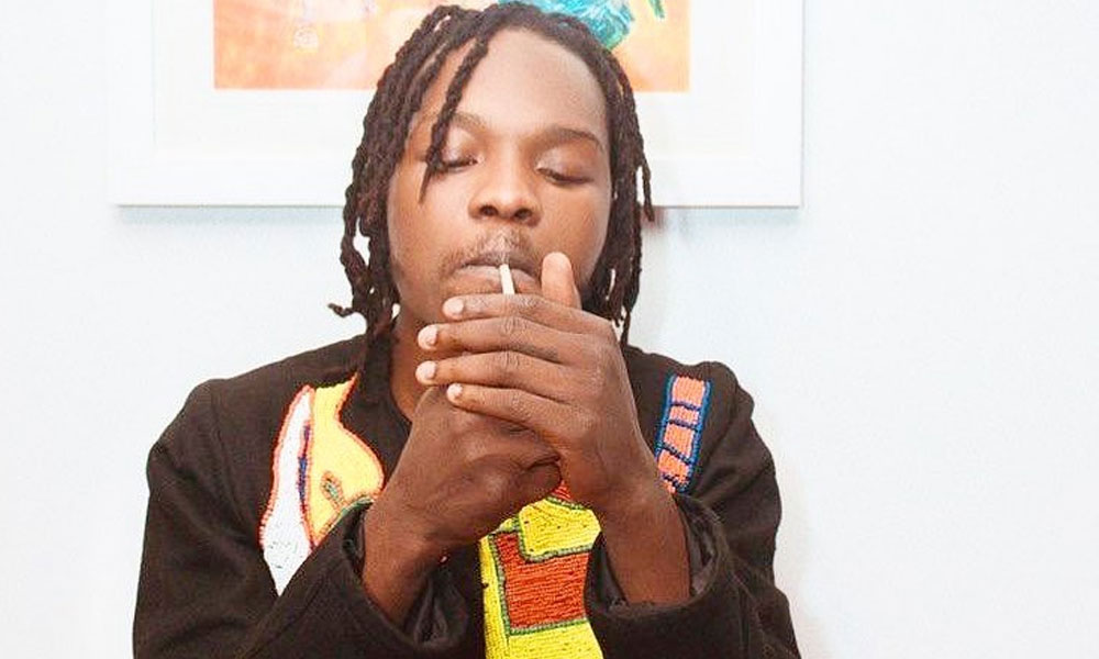 Naira Marley smoking