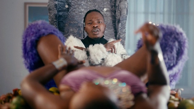 Video:- Naira Marley – Coming ft. Busiswa