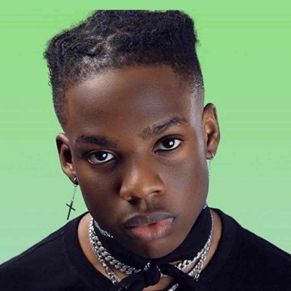 Rema Shows His New “Raver” Tattoo (See Photos)