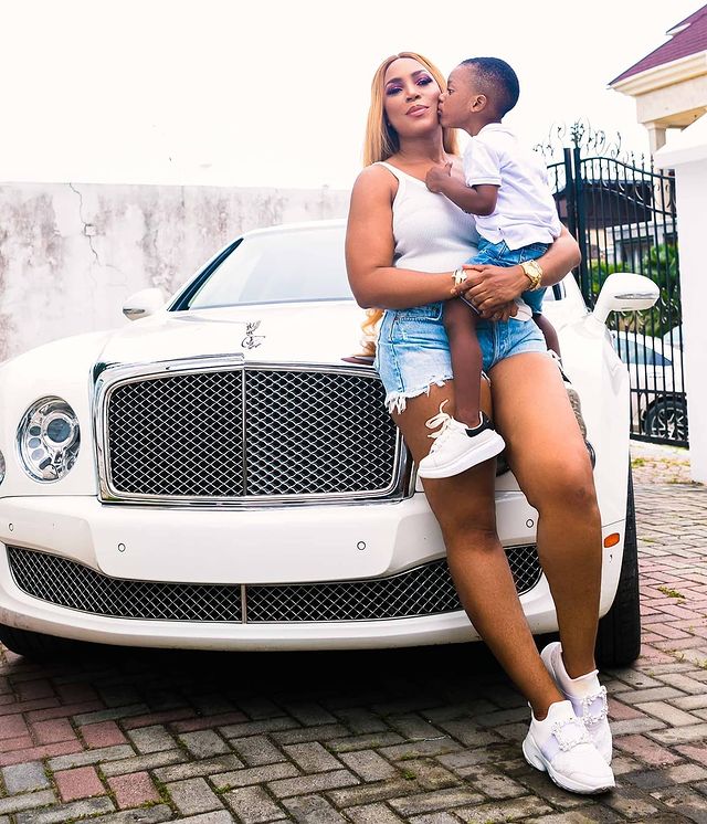 Linda Ikeji And Son, Jayce Pictured With Her Luxury Bentley Car