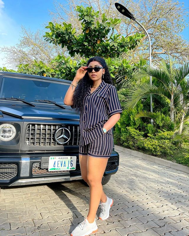 Regina Daniels Poses With Her Customized G-Wagon