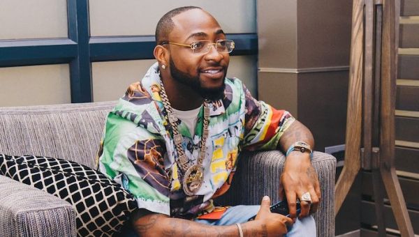Davido Compares His Look On Yankee Passport Vs His Look On Naija Passport (See Photos)