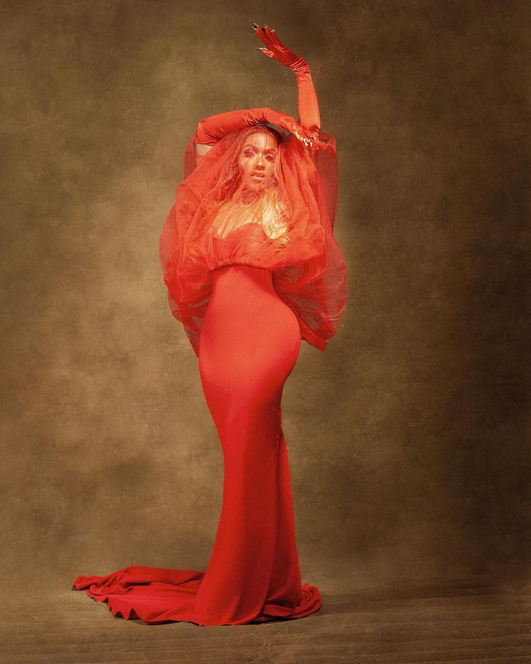 Mercy Eke Stuns In Red In Christmas Photoshoot