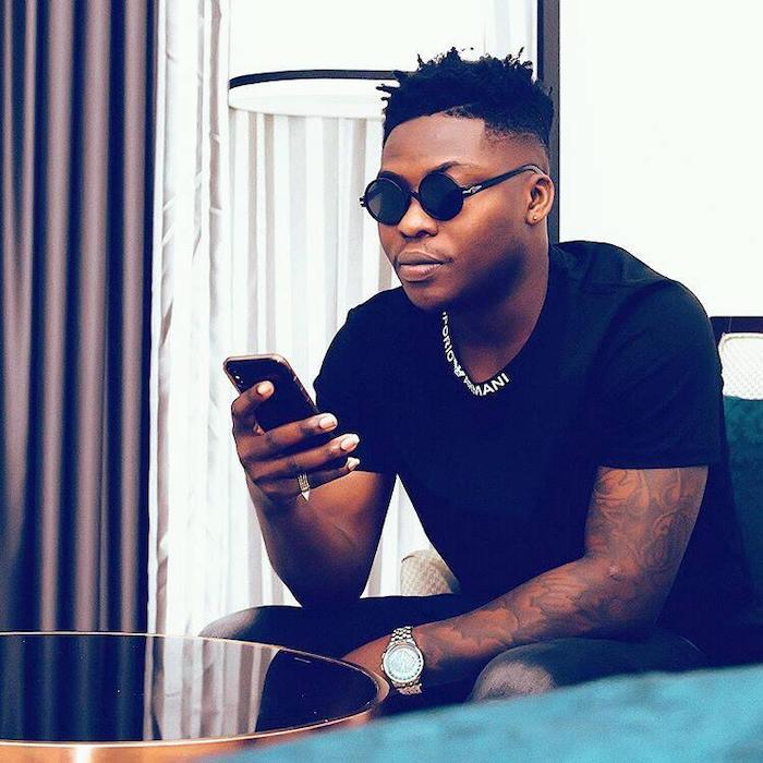 Singer, Reekado Banks Calls Out Bolt On His Producer’s Missing Bag